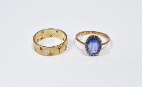 Gold-coloured metal and blue stone dress ring set oval claw set blue stone and a 9ct gold and