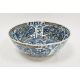 Persian (Iran) blue and white bowl, 18th century, painted with panels of flowers and lappet-shaped - Image 1 of 2
