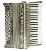 Italian ' Frontalini ' piano accordion, the silver-tone lacquered body with flower decoration,
