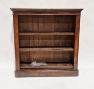 Victorian mahogany dwarf bookcase with rounded corners and three adjustable shelves, raised on a