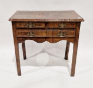 18th century walnut lowboy, the quarter veneer top with broad cross-banded border and moulded ogee