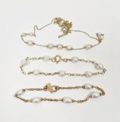 Fine gold-coloured chain and pearl necklace, a 9ct oval link and pearl bracelet and a gilt metal and