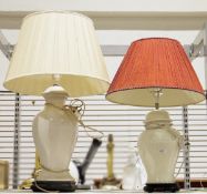 Pair of cream ground urn-shaped table lamps, on wooden bases (2)  Condition Report 50cm & 35cm