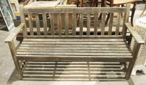 Weathered teak slatted garden bench, 152cm wide  Condition Report Estimate added