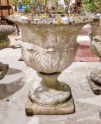 Reconstituted stone garden urn with acanthus leaf design, on square pedestal base, 63cm high x
