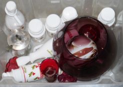 Cranberry glass etched flower vase, a collection of milk glass spice jars and oil bottles, a