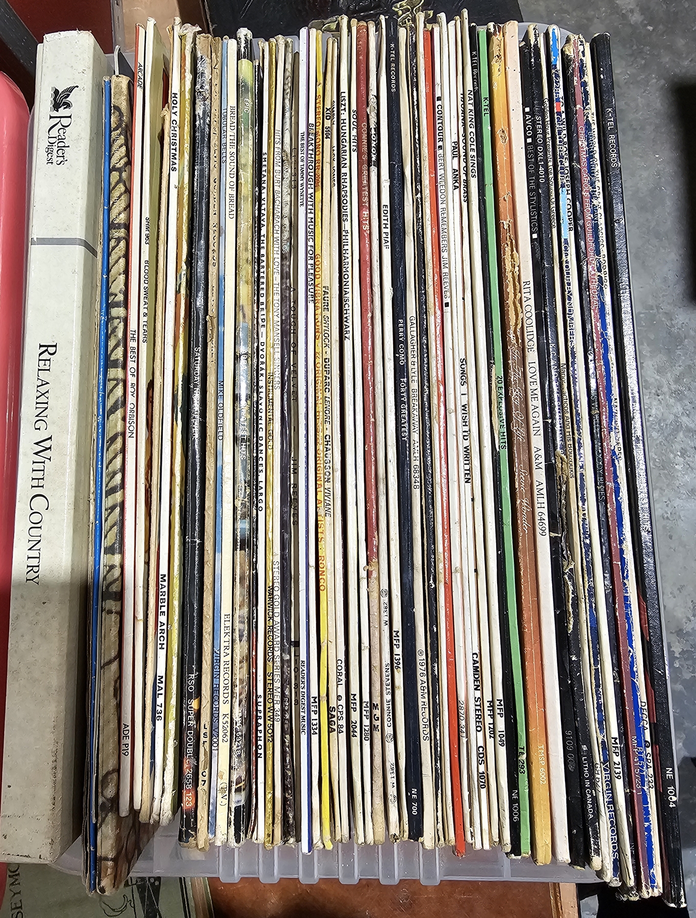 Box of vinyl LPs mostly easy listening and pop including Nat King Cole, Stevie Wonder, Songs in