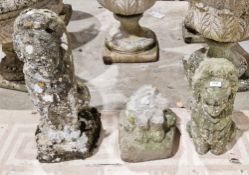 Pair of reconstituted stone sitting lions, one damaged (2)