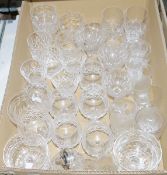 Quantity of cut and moulded glass to include champagne flutes, sherry glasses, dessert saucers,