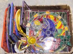 Large quantity of stained glass homemade panels to include dolphins, stars, sun, a parachuting bear,