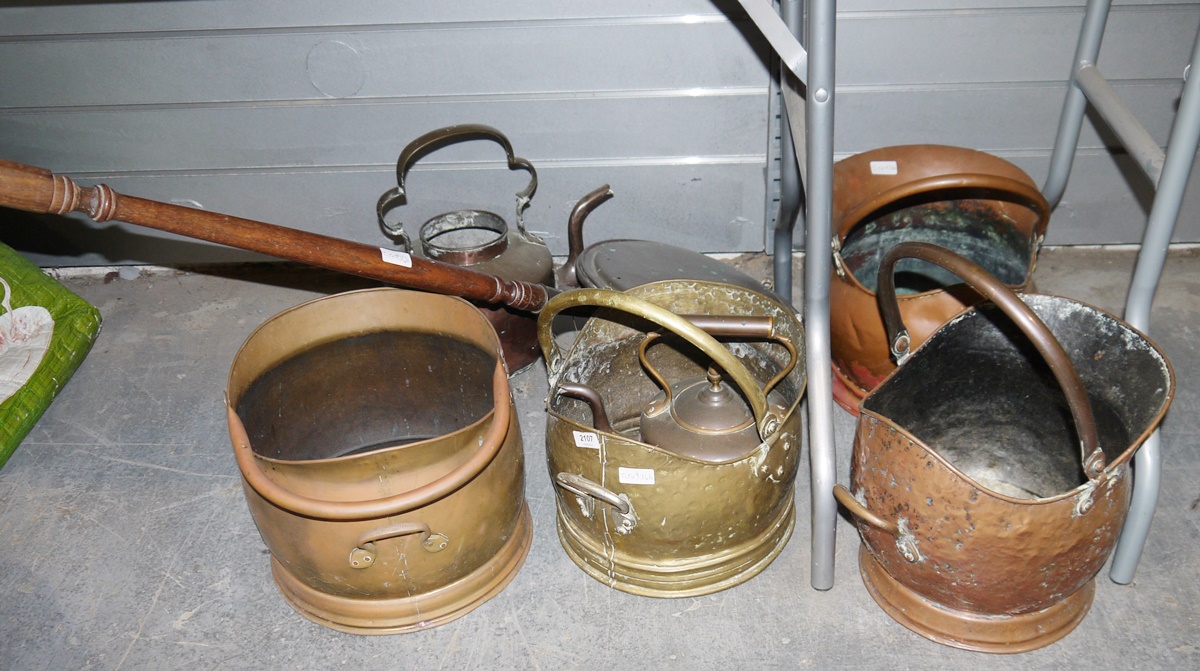 Collection of metalware to include three brass and one copper coal scuttles, two copper teapots