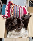 Quantity of textiles to include a fur stole, lace doilies, etc, a vintage red British Telecom