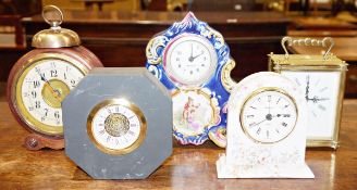Small collection of clocks to include a President porcelain cased desk clock with butterfly and