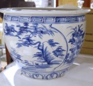 Italian ceramic basket of lemons, a large blue and white stick stand, a blue and white jardiniere of