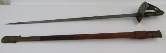 Dress sword and leather scabbard belonging to an officer in the Royal Engineers, made by Robert Mole