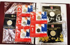 Coin album consisting of 63, 2012 Olympic 50p's with 4 x £5 coins