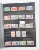 British Empire: KGV Silver Jubilee omnibus in blue stockbook, all mint sets complete including key