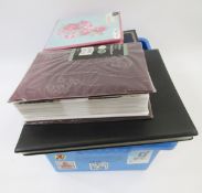 Extensive collection of vintage and antique postcards, housed in 13 albums, most being of