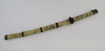 Early 20th century wakizashi with highly carved bone scabbard.