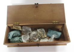 A large mixture of British and world coins within wooden box consisting of Victorian bun pennies,
