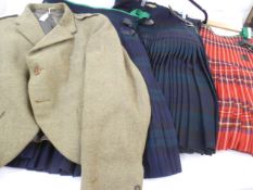 Three Scottish tartan gentleman's kilts and a tweed jacket with epaulettes, labelled Hugh Macpherson