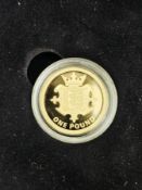 2014 Jersey Gold Proof £1, Coronated head right, rev. garnished shield with three leopards passant