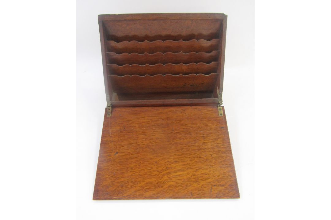 Oak stationery rack with sloping front, serpentine dividers to the interior, 34cm wide x 15cm deep x - Image 6 of 6