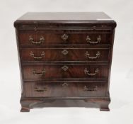 Mahogany and cross banded chest of drawers in the George III manner, the thumb moulded top over a