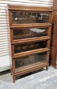 Early 20th century Globe Wernicke oak sectional stacking bookcase comprising four up and over glazed