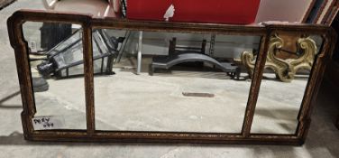 Early 20th century walnut and parcel gilt triple pane overmantel mirror, 98cm x 44cm
