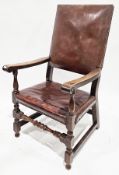 Oak framed high back elbow chair in the 17th century manner, with brown leather studded