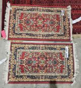 Two small runners with red, blue and gold design patterns, floral on red background, each 59cm x