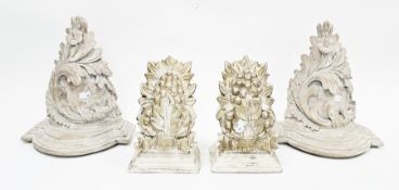 Two pairs of wooden carved wall brackets, one pair with limed finish and carved with scrolling