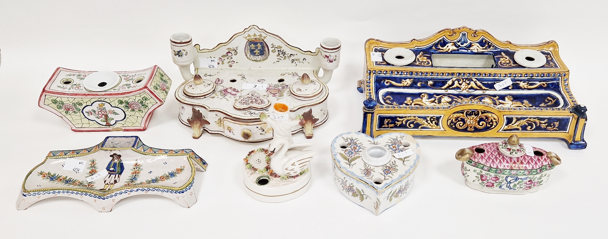 Group of French faience inkwells, late 19th/early 20th century, including: a Gien blue-ground