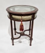 19th century French mahogany bijouterie table, the circular hinged lid with glass panel and gilt
