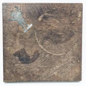 Early 20th century square oak breadboard of Winchester College interest, the top left corner inset