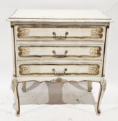 Early 20th century French chest of three long drawers with a crackled white painted finish, the