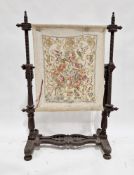 Victorian wooden tapestry frame with turned screw mechanism to side supports, the turned screw