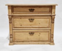 19th century continental pine chest of three graduating drawers, the top with thumb nail moulded