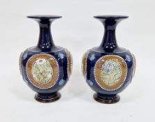Pair of Royal Doulton stoneware blue ground Art Nouveau vases, circa 1890, impressed factory