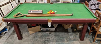 Modern half-size snooker/pool table with green baize playing surface and mahogany-effect base,