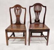Pair of late 18th/early 19th century Hepplewhite-style country oak dining chairs with solid seats,
