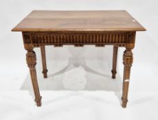 Victorian oak table, the top with thumb nail moulded edge, the apron with reeded carving and