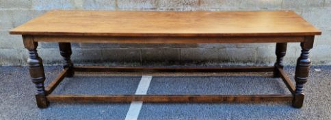 Oak refectory-style table in the 17th century manner, the plain top over a plain apron and four legs