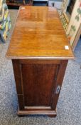 Early 20th century mahogany single pedestal cupboard, the single door opening to two deep shelves