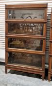 Early 20th century Globe Wernicke oak sectional stacking bookcase comprising four up and over glazed