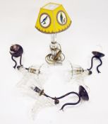 Three early 20th century gilt metal wall light fittings, each with a Murano style clear fluted glass