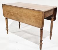 19th century mahogany drop-flap dining table with drawer to one end and raised on turned tapering