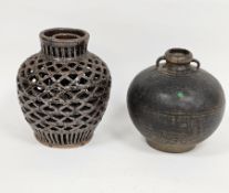 Thai stoneware globular two-handled jar, probably 15-16th century, with lug handles, the shoulder