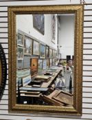Modern rectangular bevelled edge mirror, with moulded gilt frame, 100cm x 70cm